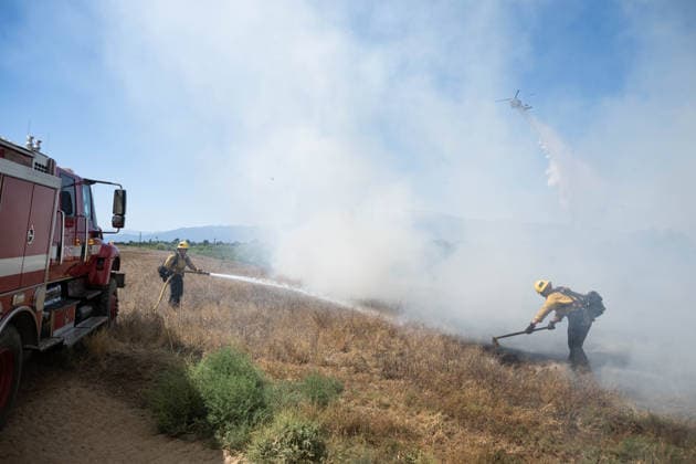Bain Fire erupts in Jurupa Valley burns over 600 acres CALIFORNIA, US - MAY 19: San Bernadino County Firefighters seen during the Bain Fire originating from Jurupa Valley, California, United States on May 19, 2026. Jon Putman Anadolu California United States. Editorial use only. Please get in touch for any other usage.  Copyright: x2026xAnadoluxJonxPutmanx