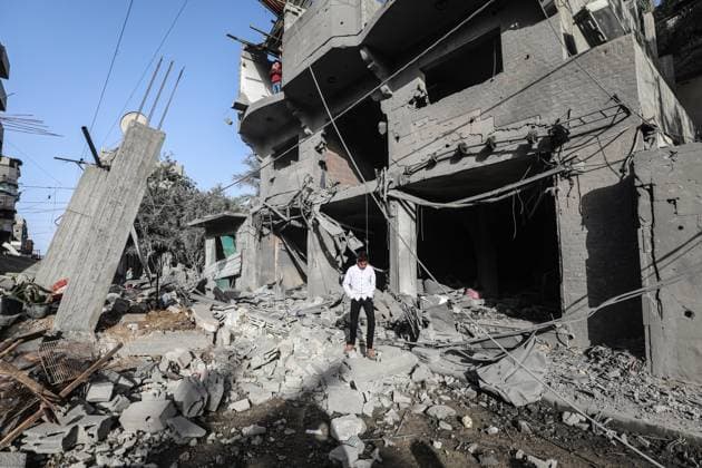 Israeli army targets building in the Bureij camp in Gaza BUREIJ, GAZA, PALESTINE - MAY 20: Palestinians inspect the destruction of a residential building belonging to the Abu Shamala family following an Israeli air strike at the Bureij camp in the central Gaza Strip, Palestine on May 20, 2026. The targeted attack completely flattened the multi-story structure and caused extensive structural damage to numerous neighboring homes. Moiz Salhi Anadolu Bureij Gaza. Editorial use only. Please get in touch for any other usage.  Copyright: x2026xAnadoluxMoizxSalhix