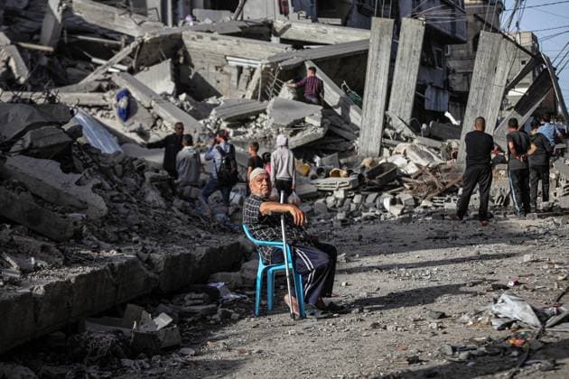 Israeli army targets building in the Bureij camp in Gaza BUREIJ, GAZA, PALESTINE - MAY 20: Palestinians inspect the destruction of a residential building belonging to the Abu Shamala family following an Israeli air strike at the Bureij camp in the central Gaza Strip, Palestine on May 20, 2026. The targeted attack completely flattened the multi-story structure and caused extensive structural damage to numerous neighboring homes. Moiz Salhi Anadolu Bureij Gaza. Editorial use only. Please get in touch for any other usage.  Copyright: x2026xAnadoluxMoizxSalhix