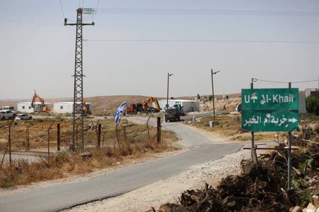Illegal Israeli settlers expand outpost in West Bank s Umm al-Khair HEBRON, WEST BANK, PALESTINE - MAY 20: Prefabricated houses installed by illegal Israeli settlers are seen under the protection of the Israeli army in the village of Umm al-Khair, located in the Masafer Yatta region south of Hebron in West Bank, Palestine on May 20, 2026. Illegal settlers continue to expand a newly established settlement outpost, seizing Palestinian lands in the area. Wisam Hashlamoun Anadolu Hebron West Bank. Editorial use only. Please get in touch for any other usage.  Copyright: x2026xAnadoluxWisamxHashlamounx
