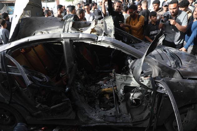 Palestinians Gather at Site of Israeli Strike in Gaza City others. May 20, 2026: Palestinians Gather at Site of Israeli Strike in Gaza City Palestinians gather at the site of an Israeli airstrike that targeted a vehicle on al-Shuhada Street in Gaza City, on May 19, 2026. According to local sources, the strike killed one person and wounded several others. Copyright: xx
