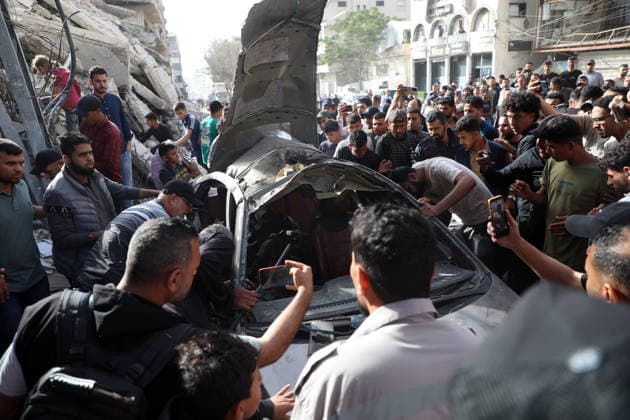 Palestinians Gather at Site of Israeli Strike in Gaza City others. May 20, 2026: Palestinians Gather at Site of Israeli Strike in Gaza City Palestinians gather at the site of an Israeli airstrike that targeted a vehicle on al-Shuhada Street in Gaza City, on May 19, 2026. According to local sources, the strike killed one person and wounded several others. Copyright: xx