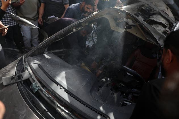 Palestinians Gather at Site of Israeli Strike in Gaza City others. May 20, 2026: Palestinians Gather at Site of Israeli Strike in Gaza City Palestinians gather at the site of an Israeli airstrike that targeted a vehicle on al-Shuhada Street in Gaza City, on May 19, 2026. According to local sources, the strike killed one person and wounded several others. Copyright: xx