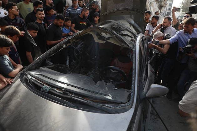 Palestinians Gather at Site of Israeli Strike in Gaza City others. May 20, 2026: Palestinians Gather at Site of Israeli Strike in Gaza City Palestinians gather at the site of an Israeli airstrike that targeted a vehicle on al-Shuhada Street in Gaza City, on May 19, 2026. According to local sources, the strike killed one person and wounded several others. Copyright: xx