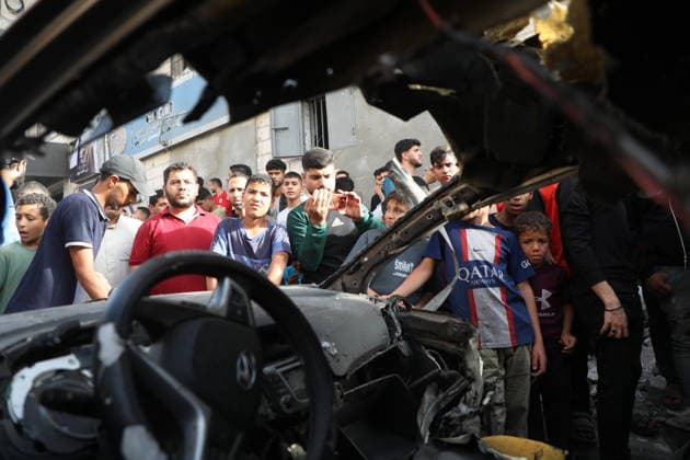 Palestinians Gather at Site of Israeli Strike in Gaza City others. May 20, 2026: Palestinians Gather at Site of Israeli Strike in Gaza City Palestinians gather at the site of an Israeli airstrike that targeted a vehicle on al-Shuhada Street in Gaza City, on May 19, 2026. According to local sources, the strike killed one person and wounded several others. Copyright: xx