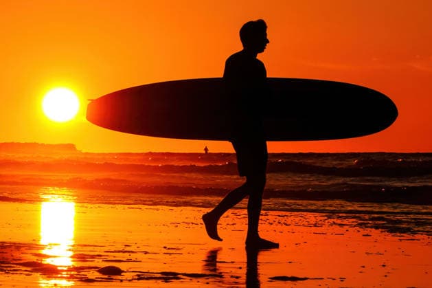 May 20, 2026, Isle Of Palms, Sc, United States: A surfer silhouetted by the sunrise carries his board out into deeper water on Front Beach, May 20, 2026 in Isle of Palms, South Carolina. Isle Of Palms United States - ZUMAe02_ 20260520_zaf_e02_004 Copyright: xRichardxEllisx