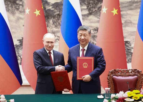 (260520) -- BEIJING, May 20, 2026 -- Chinese President Xi Jinping and Russian President Vladimir Putin sign a joint statement on further enhancing the comprehensive strategic coordination and deepening good-neighborliness and friendly cooperation between the two countries after their talks at the Great Hall of the People in Beijing, capital of China, May 20, 2026. Xi held talks with Putin, who is on a state visit to China, at the Great Hall of the People in Beijing on Wednesday. ) CHINA-BEIJING-XI JINPING-RUSSIA-PUTIN-TALKS (CN) DingxHaitao
