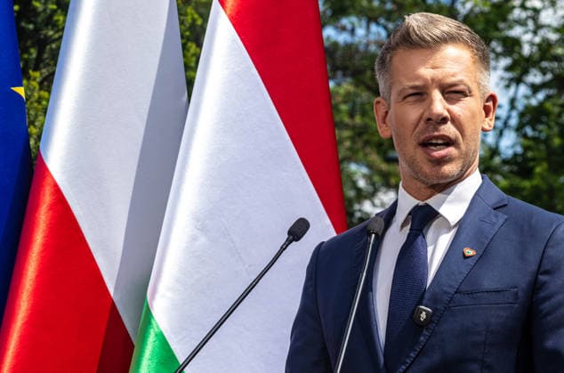 May 20, 2026, Warsaw, Poland: New Hungarian Prime Minister, Peter Magyar seen talking to the press during his meeting with the Polish Prime Minister, Donald Tusk . On the morning of Wednesday, the 20th of May, on his first foreign visit, the new Prime Minister of Hungary, Peter Magyar, meets with Polish Prime Minister Donald Tusk. The visit symbolically marks the opening of a new phase in Budapest s relations with Europe. During the meeting the Prime Ministers discuss Magyar s victory in the recent Hungarian elections, the Polish-Hungarian relationship, and the issue of Zbigniew Ziobra and Marcin Romanowski - two Polish politicians evading prosecution in Poland by hiding in Hungary. After the meeting, Peter Magyar meets with the Polish Pres - ZUMAs197 20260520_aaa_s197_279 Copyright: xNeilxMiltonx
