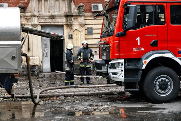 RECORD DATE NOT STATED Russian Drone Attack on Odesa Leaves People Injured Firefighters deal with the aftermath of a Russian drone attack in Odesa, Ukraine, on May 18, 2026. As a result of a massive overnight attack by Russian strike drones, several residential buildings in the Prymorskyi and Kyivskyi districts sustained significant damage. Roofs of three-storey buildings were destroyed, while a one-storey house was ruined in another area. Buildings of a city lyceum and a kindergarten were also damaged. Two people, an 11-year-old boy and a 59-year-old man, were injured Photo by Nina Liashonok Ukrinform ABACAPRESS.COM Odesa Ukraine  Copyright: xLyashonokxNina Ukrinform ABACAx