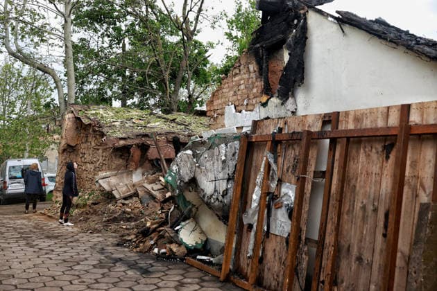 RECORD DATE NOT STATED Russian Drone Attack on Odesa Leaves People Injured People inspect a private residential house destroyed as a result of a Russian drone attack in Odesa, Ukraine, on May 20, 2026. During the night of May 20, the city came under a massive attack by Russian strike drones. The attack caused destruction of residential buildings, fires at commercial facilities, and damage to critical infrastructure. One civilian was injured Photo by Nina Liashonok Ukrinform ABACAPRESS.COM Odesa Ukraine  Copyright: xLyashonokxNina Ukrinform ABACAx