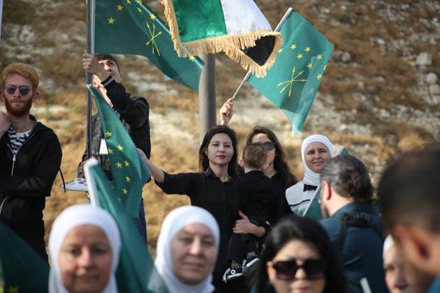 Syrian Circassians commemorate to mark the 162nd anniversary of their exile in Aleppo ALEPPO, SYRIA - MAY 21: Circassians gather to commemorate the 162nd anniversary of the 1864 Circassian Exile, holding memorial events and honoring those who lost their lives during the deportation, on May 21, 2026, in Aleppo, Syria. Participants held a moment of silence in front of the Aleppo Citadel, wearing black T-shirts and traditional Circassian clothing while carrying Circassian and Syrian flags. Kasim Yusuf Anadolu Aleppo Syria. Editorial use only. Please get in touch for any other usage.  Copyright: x2026xAnadoluxKasimxYusufx