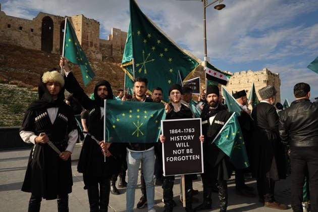 Syrian Circassians commemorate to mark the 162nd anniversary of their exile in Aleppo ALEPPO, SYRIA - MAY 21: Circassians gather to commemorate the 162nd anniversary of the 1864 Circassian Exile, holding memorial events and honoring those who lost their lives during the deportation, on May 21, 2026, in Aleppo, Syria. Participants held a moment of silence in front of the Aleppo Citadel, wearing black T-shirts and traditional Circassian clothing while carrying Circassian and Syrian flags. Kasim Yusuf Anadolu Aleppo Syria. Editorial use only. Please get in touch for any other usage.  Copyright: x2026xAnadoluxKasimxYusufx