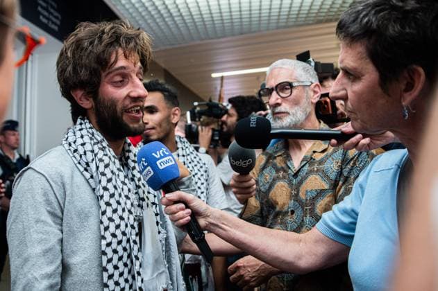 Belgian activist Isja pictured as Belgian activists who were part of the Gaza Flotilla arrive at Brussels Airport, in Zaventem, Friday 22 May 2026.  EMILExWINDAL 174748563