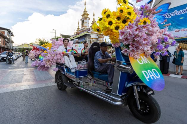 May 24, 2026, Chiang Mai, Thailand: Participants ride on a flower-decorated Tuk Tuk vehicle during The Chiang Mai Pride Parade 2026 celebrations. The Chiang Mai Pride Parade 2026 took place in Chiang Mai, Thailand. Chiang Mai province holds Thailandis first Pride Month celebrations annually, promoting gender equality, diversity, and human rights as part of Pride Month activities in northern Thailand. Chiang Mai Thailand - ZUMAs197 20260524_aaa_s197_139 Copyright: xPongmanatxTasirix