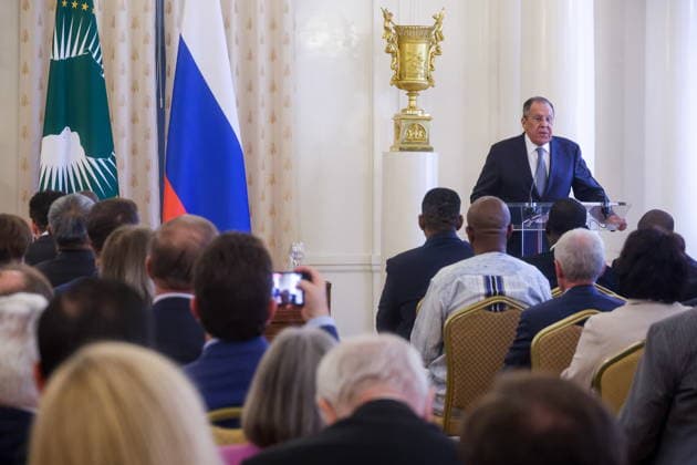 RUSSIA, MOSCOW - MAY 25, 2026: Russia s Minister of Foreign Affairs Sergei Lavrov (R back) speaks during a reception for the heads of missions at the Reception House of Russia’s Ministry of Foreign Affairs on Africa Day. Sergei Fadeichev TASS  93026856