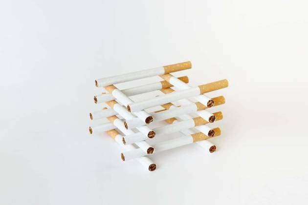 composition of cigarettes on white background Copyright: xartushx Panthermedia66720186.jpg