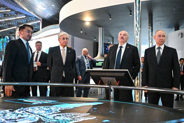 KAZAKHSTAN, ASTANA - MAY 28, 2026: Kazakhstan s President Kassym-Jomart Tokayev, Belarus President Alexander Lukashenko and Russia s President Vladimir Putin (L-R) attend an exhibition dedicated to IT projects of the Eurasian Economic Union (EAEU) member states at the Alem.ai International Artificial Intelligence Center Astana Kazakhstan  - ZUMAt113 20260528_zaa_t113_580 Copyright: xSergeixBobylevx