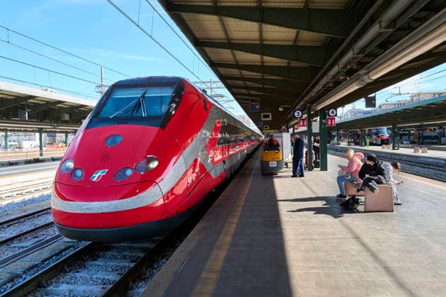Trenitalia Trains At Bari Centrale Station A Trenitalia Frecciarossa 1000 high-speed train stands at a platform of Bari Centrale station as passengers wait and railway workers operate on the platform, on March 9, 2026, in Bari, Italy. Bari Italy  Copyright: xMatteoxDellaxTorrex originalFilename: dellatorre-notitle260210_np6H6.jpg