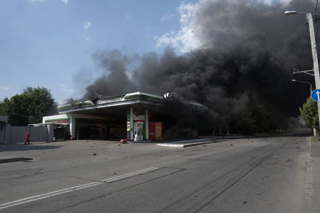 Aftermath of Russian UAV strike in Kharkiv KHARKIV, UKRAINE - JULY 3: Flames rise from a car and a fuel dispenser following UAV attack by Russia on a gas station near the city center of Kharkiv, Ukraine on July 03, 2026. There were no fatalities in the attack. Serhii Masin Anadolu Kharkivs ka Oblast Ukraine. Editorial use only. Please get in touch for any other usage.  Copyright: x2026xAnadoluxSerhiixMasinx