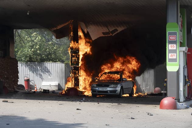 Aftermath of Russian UAV strike in Kharkiv KHARKIV, UKRAINE - JULY 3: Flames rise from a car and a fuel dispenser following UAV attack by Russia on a gas station near the city center of Kharkiv, Ukraine on July 03, 2026. There were no fatalities in the attack. Serhii Masin Anadolu Kharkivs ka Oblast Ukraine. Editorial use only. Please get in touch for any other usage.  Copyright: x2026xAnadoluxSerhiixMasinx