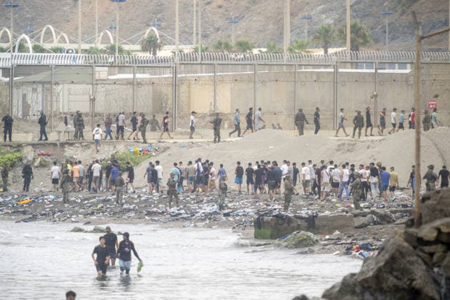 Hundreds of migrants reach Spain s Ceuta after swimming from Morocco CEUTA, SPAIN - JULY 31: Hundreds of migrants attempt to swim from Morocco to the Spanish city of Ceuta in North Africa, while the number of arrivals exceeded 1,500 in just over a week, according to local news, in Ceuta, Spain on July 31, 2026. Marcos Moreno Anadolu Ceuta Spain. Editorial use only. Please get in touch for any other usage.  Copyright: x2026xAnadoluxMarcosxMorenox