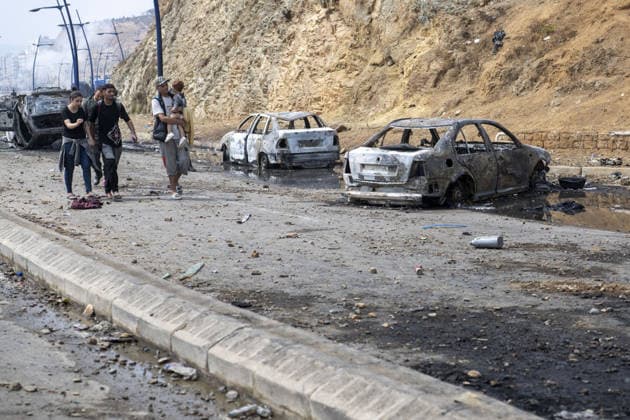 Spain says over 48,300 migrants have returned to Morocco from Ceuta CEUTA, SPAIN - JULY 31: Burned-out vehicles remain on a road near the border with Ceuta as undocumented migrants, mostly young men, who entered Spain s North African enclave of Ceuta illegally, begin returning to Morocco after realizing their chances of obtaining legal status in Spain are unlikely on July 31, 2026. Meanwhile, small groups of migrants continue trying to cross into Ceuta by swimming or climbing the breakwater surrounding the Fnideq coast. More than 48,300 of the approximately 50,000 migrants who entered the Spanish enclave of Ceuta since early Thursday have returned to Morocco by Friday afternoon, Spain s Interior Ministry said, according to EFE news agency. Copyright: x2026xAnadoluxAbuxAdemxMuhammedx