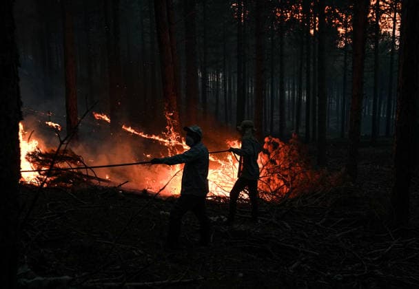 Firefighting efforts continue in Aydin s Cine AYDIN, TURKIYE - JULY 31: Firefighters extinguish fire at a forested area as aerial and ground crews continue battling a wildfire in the Cine district of Aydin, Turkiye on July 31, 2026. Mahmut Serdar Alakus Anadolu Aydin Turkey. Editorial use only. Please get in touch for any other usage.  Copyright: x2026xAnadoluxMahmutxSerdarxAlakusx