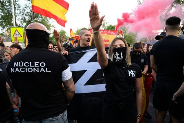 July 31, 2026, Madrid, Spain: MADRID, SPAIN Ã¢â‚¬ JULY 31, 2026: Participants attend a demonstration outside the Moroccan Embassy in Madrid, called by the far-right groups Falange EspaoÂ±ola and NoÂºcleo Nacional, following recent migrant arrivals through Spain s North African enclave of Ceuta. Protesters wave Spanish flags, display banners and chant slogans during the demonstration, while some participants are seen making gestures commonly associated with Nazi salutes. Madrid Spain  - ZUMAq101 20260731_zna_q101_218 Copyright: xTomasxCallex