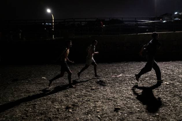 August 1, 2026, Ceuta, Spain: CEUTA, SPAIN - AUGUST 1, 2026: The arrival of migrants across the Tarajal border continues during the early hours of Saturday morning in Ceuta. Authorities maintain security and monitoring devices at the border crossing amid the ongoing influx. Ceuta Spain  - ZUMAq101 20260801_zna_q101_066 Copyright: xSamuelxVegax
