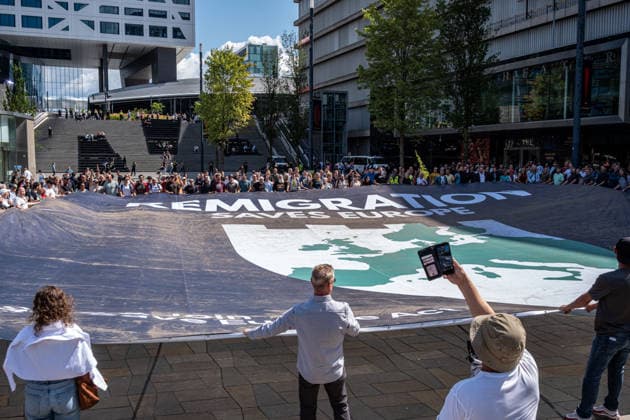 August 1, 2026, Utrecht, Utrecht, The Netherlands: The organization Save Europe Act is kicking off the so-called European Shield Tour at Jaarbeursplein in Utrecht. During the demonstration, several participants are wearing clothing bearing the word Ã¢â‚¬ËœRemigration,Ã¢â‚¬â ¢ and a large banner with the same text is rolled out. Speakers are calling for remigration. Among those present, several Dutch flags and a Flemish flag are visible. Utrecht The Netherlands  - ZUMAg281 20260801_zaf_g281_009 Copyright: xStormxGroenendijkx