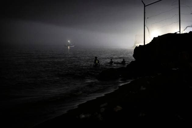 August 1, 2026, Ceuta, Spain: CEUTA, SPAIN - AUGUST 1, 2026: The arrival of migrants across the Tarajal border continues during the early hours of Saturday morning in Ceuta. Authorities maintain security and monitoring devices at the border crossing amid the ongoing influx. Ceuta Spain - ZUMAq101 20260801_zna_q101_061 Copyright: xSamuelxVegax
