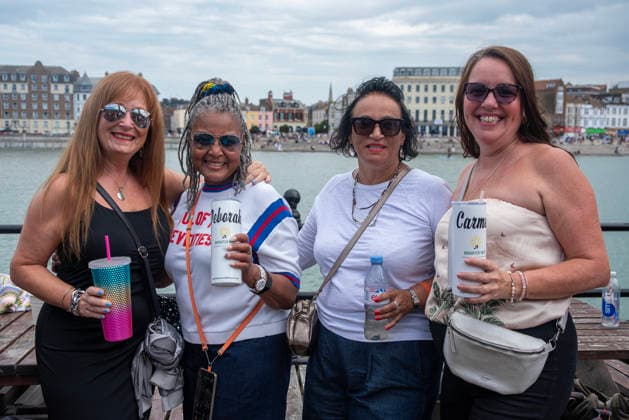 August 1, 2026, Margate, United Kingdom: Revellers pose for a photo during the Margate Soul Festival. The Margate Soul Weekender (also known as Margate Soul Festival) celebrated its 25th anniversary from Friday, July 31 to Sunday, August 2, 2026. It is widely recognized as the UK s largest independent soul street party and festival. Spanning three days, it transforms the seaside town into a massive celebration of soul, funk, jazz-funk, reggae, and R&B. Margate United Kingdom - ZUMAs197 20260801_aaa_s197_106 Copyright: xKrisztianxElekx