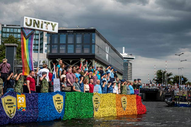 August 1, 2026, Amsterdam, North Holland, Netherlands: Members of the Dutch military join Amsterdam Pride s Canal Parade. August 1, 2026, Amsterdam, the Netherlands. Hundreds of thousands of spectators joined the 30th edition of the Pride Canal Parade, the highlight of WorldPride Amsterdam 2026. This yearâ€⠢s parade also included the WorldPride Stadium grandstand, with seating for approximately 10,000 people to watch as floats pass. Amsterdam Netherlands - ZUMAp202 20260801_zip_p202_021 Copyright: xJamesxPetermeierx