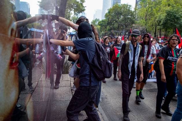 August 1, 2026, Mexico City, Mexico: MEXICO Mexico City, MEXICO Ã¢â‚¬ AUGUST 1, 2026: Demonstrators take part in a pro-Palestinian rally in Mexico City, calling for an end to Israeli military operations in Gaza. Participants also urged the Mexican government to sever diplomatic relations and suspend bilateral agreements with Israel. Mexico City Mexico - ZUMAq101 20260801_zna_q101_286 Copyright: xAddixSetyawanx