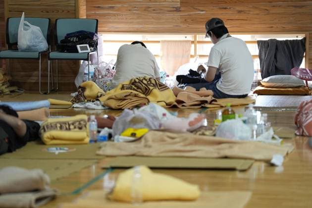 Aftermath of strong earthquake in Kumamoto People sit in an evacuation center in Uki in Kumamoto Prefecture, southwestern Japan, on Aug. 1, 2026, after a powerful earthquake struck the region on July 28.  A14AA0005624890P