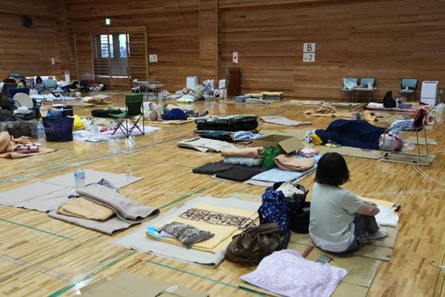 Aftermath of strong earthquake in Kumamoto An evacuee sits in an evacuation center in Uki in Kumamoto Prefecture, southwestern Japan, on Aug. 1, 2026, after a powerful earthquake struck the region on July 28.  A14AA0005624892P