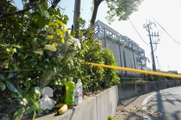 Aftermath of strong earthquake in Kumamoto Flowers and bottled drinks are placed near the Aeon Mall Kumamoto shopping center in the town of Kashima in Kumamoto Prefecture, on Aug. 3, 2026, after the building s deadly explosion following a powerful earthquake that struck the southwestern Japan region on July 28.  A14AA0005624941P