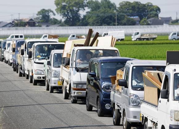 Aftermath of strong earthquake in Kumamoto A street in Hikawa, Kumamoto Prefecture, southwestern Japan, is congested with vehicles carrying waste and rubble on Aug. 3, 2026, after a powerful earthquake struck the region on July 28.  A14AA0005624982P