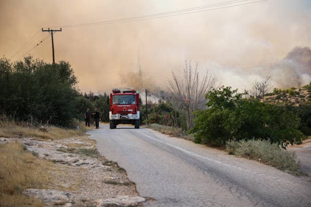 Wildfire in Greece s Megara region MEGARA, GREECE - AUGUST 3: Firefighters operate on the ground as a wildfire continues to burn for a third consecutive day in the Megara region, west of Athens, Greece on August 3, 2026. Emergency services are working to contain the blaze amid challenging weather conditions across the area. Aris Oikonomou Anadolu Megara Greece. Editorial use only. Please get in touch for any other usage.  Copyright: x2026xAnadoluxArisxOikonomoux