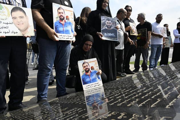Memorial ceremony held in Lebanon to mark sixth anniversary of Beirut Port explosion BEIRUT, LEBANON - AUGUST 4: People attend a memorial ceremony held in front of the monument bearing the names of those killed in the Aug. 4, 2020 Beirut Port explosion, marking the sixth anniversary of the disaster while holding photos, in Beirut, Lebanon, on August 4, 2026. The ceremony was attended by families of the victims, Lebanese Justice Minister Adel Nassar, Information Minister Paul Markus, Social Affairs Minister Haneen El Sayed, ambassadors of several countries that lost citizens in the explosion, and other members of the diplomatic corps. Houssam Shbaro Anadolu Beirut Lebanon. Editorial use only. Please get in touch for any other usage. Copyright: x2026xAnadoluxHoussamxShbarox