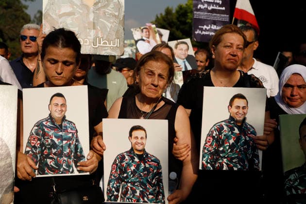 August 4, 2026, Beirut, Beirut, lebanon: Families of victims of the 2020 Beirut Port explosion take part in a central memorial march marking the sixth anniversary of the disaster in Beirut, Lebanon, on August 4, 2026. The march begins at the Beirut Fire Brigade while a second procession starts from Martyrs Square, with both converging near the Emigrant Statue facing the Beirut Port. Participants carry portraits of their relatives who were killed in the massive explosion as they continue to demand truth and justice Beirut lebanon - ZUMAb339 20260804_znp_b339_009 Copyright: xAbdulxKaderxAlxBayx