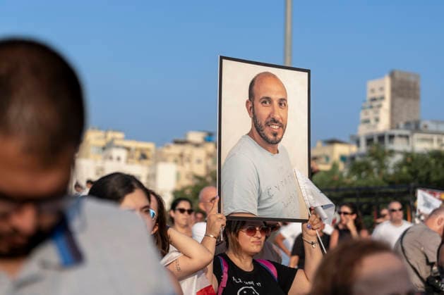 Beirut Lebanon Blast Anniversary A participant holds a portrait among the crowd during a commemoration marking the sixth anniversary of the Beirut port explosion in Beirut, Lebanon on August 4, 2026. The blast killed more than 220 people, injured thousands and displaced hundreds of thousands, while victims™ families continue to demand justice and accountability. Beirut Beirut Lebanon Copyright: xSilviaxCasadeix