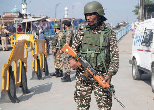 August 5, 2026, Srinagar, Jammu And Kashmir, India: Security personnel stands guard on the seventh anniversary of the abrogation of Article 370 and Jammu and Kashmir s special status,in Srinagar, Jammu and Kashmir, India, on August 5, 2026. Today marks the seventh anniversary of the abrogation of Article 370. On August 5, 2019, the Government of India revokes Article 370 of the Constitution, which grants special status to Jammu and Kashmir, and bifurcates the state into two union territories--Jammu and Kashmir, and Ladakh. Srinagar India - ZUMAz120 20260805_zip_z120_016 Copyright: xBasitxZargarx