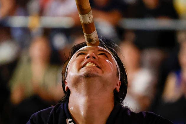 August 5, 2026, Akita, Japan: A participant balances a bamboo pole adorned with paper lanterns (kanto) on his forehead during the Akita Kanto Festival in Akita City. The annual event is one of the Tohoku region s three great festivals, where street performers skillfully balance over 270 towering bamboo poles (with the largest measuring 12 meters and weighing 50 kilograms) adorned with up to 46 candle-lit paper lanterns on their hands, shoulders, and foreheads to the rhythmic chant of dokkoisho. The festival runs from August 3 to 6. Akita Japan - ZUMAm191 20260805_aap_m191_016 Copyright: xRodrigoxReyesxMarinx