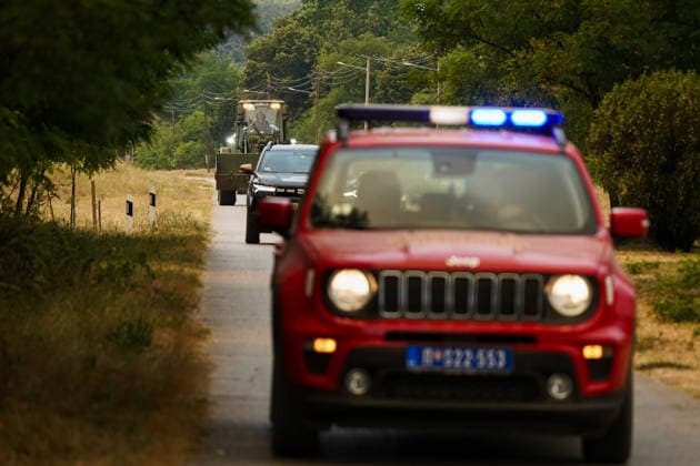 August 7, 2026, Sumarak, Vojvodina, Serbia: 202687, Sumarak, Serbia - Thick smoke rises above the landscape as a massive wildfire burns through the Deliblato Sands (Deliblatska Pescara) Special Nature Reserve. Helicopters of the Serbian Armed Forces are deployed to combat the blaze, using Bambi buckets to fetch water and extinguish the fire from the air. Deliblato Sands, often referred to as the European Sahara, is a strictly protected natural area. Sumarak Serbia - ZUMAd223 20260807_zip_d223_002 Copyright: xMarkoxDimicx
