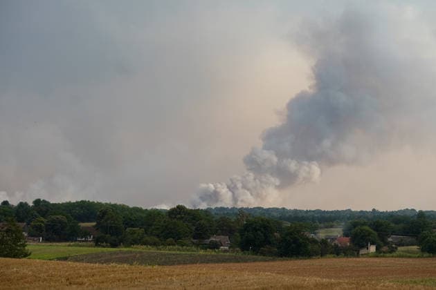 August 7, 2026, Sumarak, Vojvodina, Serbia: 202687, Sumarak, Serbia - Thick smoke rises above the landscape as a massive wildfire burns through the Deliblato Sands (Deliblatska Pescara) Special Nature Reserve. Helicopters of the Serbian Armed Forces are deployed to combat the blaze, using Bambi buckets to fetch water and extinguish the fire from the air. Deliblato Sands, often referred to as the European Sahara, is a strictly protected natural area. Sumarak Serbia - ZUMAd223 20260807_zip_d223_013 Copyright: xMarkoxDimicx
