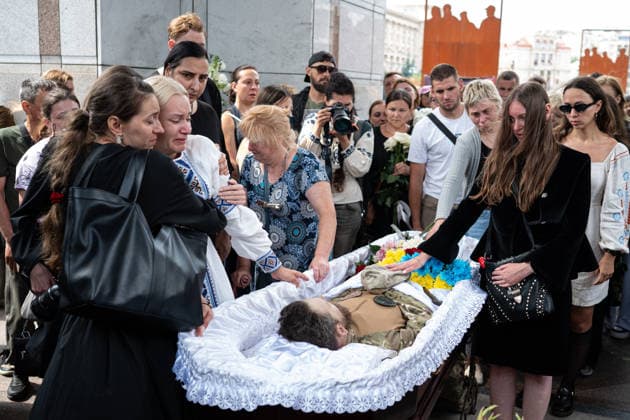 Hundreds attend the funeral of search and rescue volunteer Oleksii Yukov in Kyiv KYIV, UKRAINE - AUGUST 08: (EDITOR S NOTE: Image depicts death) Hundreds attend the funeral of search and rescue volunteer Oleksii Yukov in Kyiv, Ukraine, on August 08, 2026. Yukov was killed during a mission to retrieve the bodies of fallen Ukrainian soldiers in Donetsk region of Ukraine. Yukov had been conducting search and rescue missions to retrieve bodies of fallen Ukrainian soldiers sjnce 2014. Danylo Antoniuk Anadolu Kyiv Ukraine. Editorial use only. Please get in touch for any other usage.  Copyright: x2026xAnadoluxDanyloxAntoniukx