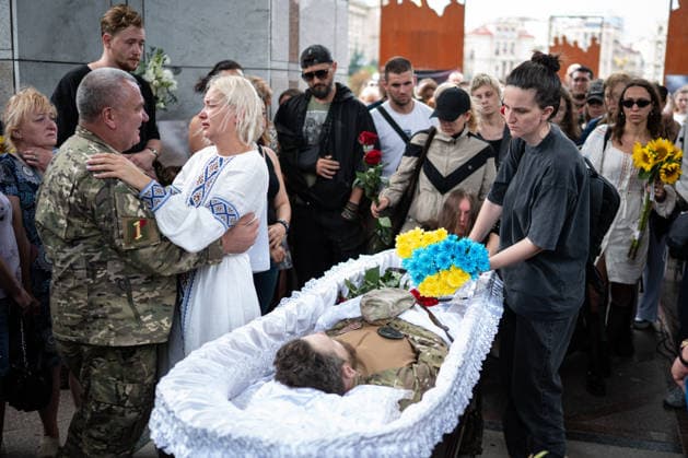 Hundreds attend the funeral of search and rescue volunteer Oleksii Yukov in Kyiv KYIV, UKRAINE - AUGUST 08: (EDITOR S NOTE: Image depicts death) Hundreds attend the funeral of search and rescue volunteer Oleksii Yukov in Kyiv, Ukraine, on August 08, 2026. Yukov was killed during a mission to retrieve the bodies of fallen Ukrainian soldiers in Donetsk region of Ukraine. Yukov had been conducting search and rescue missions to retrieve bodies of fallen Ukrainian soldiers sjnce 2014. Danylo Antoniuk Anadolu Kyiv Ukraine. Editorial use only. Please get in touch for any other usage.  Copyright: x2026xAnadoluxDanyloxAntoniukx
