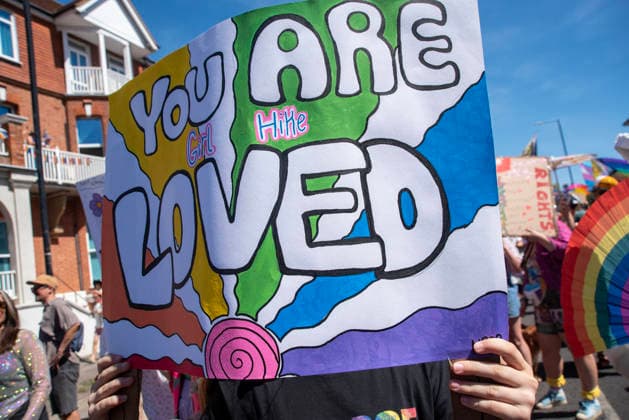 August 8, 2026, Margate, United Kingdom: An attendee holds a placard during the Margate Pride. Gays, trans and non-binary people gathered in Margate, UK to celebrate the 10th Margate Pride. The crowd paraded from the East side of the town to the town centre. Margate United Kingdom - ZUMAs197 20260808_aaa_s197_168 Copyright: xKrisztianxElekx
