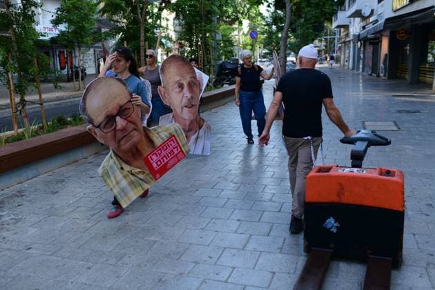 Activists Rally Outside Likud Headquarters in Tel Aviv TEL AVIV, Israel August 9, 2026: Activists demonstrate outside the headquarters of Israel™s ruling Likud party in Tel Aviv, calling for the establishment of a state commission of inquiry to investigate the circumstances and failures surrounding the October 7, 2023 attack. Demonstrators demand an official investigation into the events and the decisions made before and during the attack. Tel-Aviv Israel Copyright: x xTomerxNeubergx xJNAxPressx